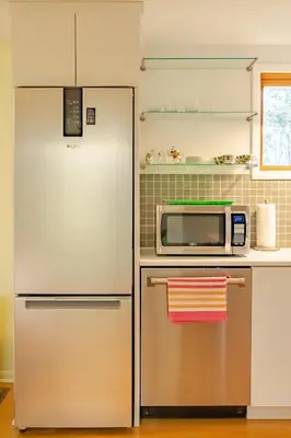 a kitchen with a refrigerator and a microwave at Quiet place with easy access NYC in River Edge