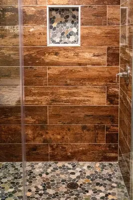 a bathroom with a shower with a wooden wall at Quiet place with easy access NYC in River Edge