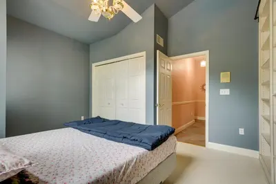 a bedroom with a bed with blue walls and a ceiling at Lancaster Vacation Rental Near Dutch Wonderland! in Lancaster