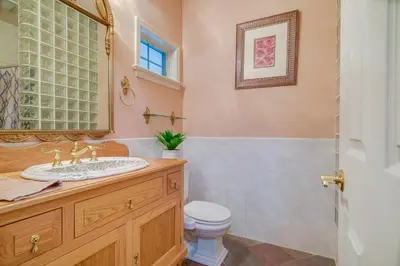 a bathroom with a sink and a toilet at Lancaster Vacation Rental Near Dutch Wonderland! in Lancaster