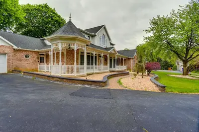 a large brick house with a large driveway at Lancaster Vacation Rental Near Dutch Wonderland! in Lancaster