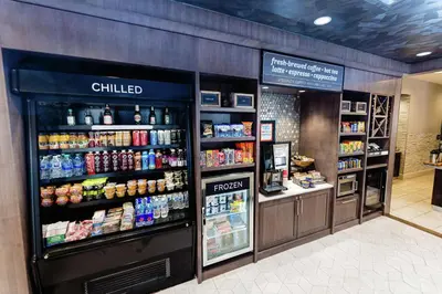 a food section of a grocery store with a chilled refrigerator at Hilton Garden Inn Exton-West Chester in Exton