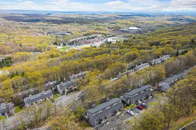 an aerial view of a train yard with trees at Tannersville Tranquility in Tannersville