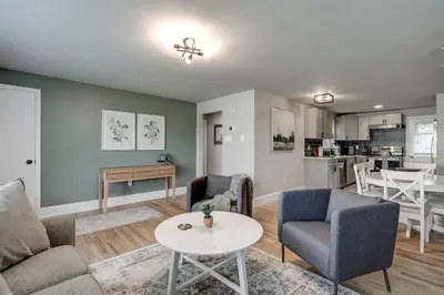 a living room with a couch and chairs and a table at New cozy home near Outlets & Amish Country in Lancaster