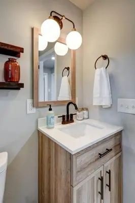 a bathroom with a sink and a mirror at New cozy home near Outlets & Amish Country in Lancaster