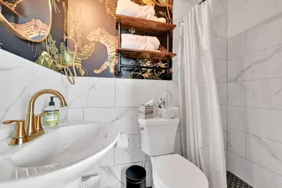 a white bathroom with a sink and a toilet at Pine Grove Scenic View Unforgettable Love Getaway in Pine Grove