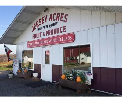 a store with a sign that readsergy acres fruit and produce at Pine Grove Scenic View Unforgettable Love Getaway in Pine Grove