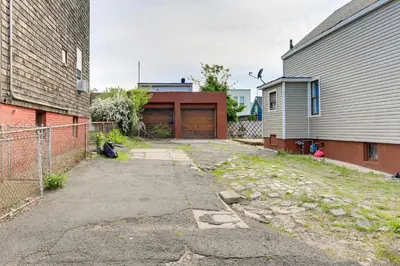 an empty driveway in front of a house at Jersey City Vacation Rental about 8 Mi to NYC! in Jersey City