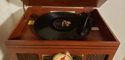 a record album in a wooden box with a clock at Family retreat, Closest Rental House to POOL & BEACH, Hot tub, Game Room in Tobyhanna
