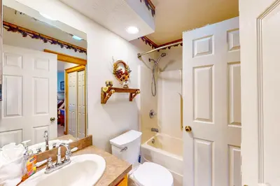 a bathroom with a sink and a toilet at Northridge 197 in Tannersville