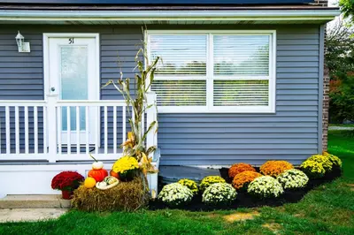 a house with a bunch of flowers in front of it at Cameron Estate Inn in Mount Joy