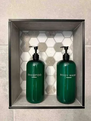 two green bottles of soap in a box at Secret Escape 20 Min from NYC N 1 in Jersey City