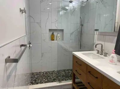 a bathroom with a shower and a sink at Sweet Home - 20 minutes to NYC in Jersey City