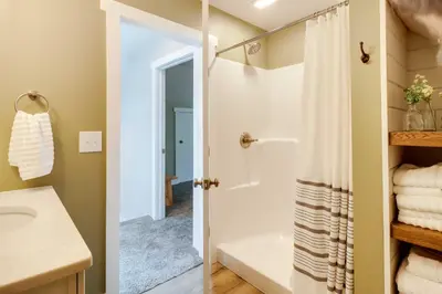 a bathroom with a shower and a sink at Pickleball Court and Fire Pit Milton Cabin! in Milton