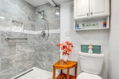 a bathroom with a shower and a toilet at Quakertown Vacation Rental Close to Hiking Trails in Quakertown