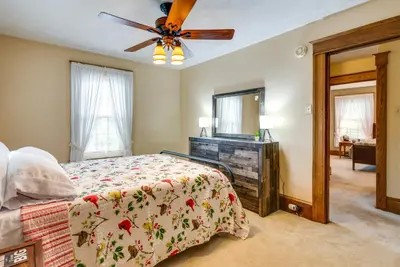 a bedroom with a bed and a ceiling fan at Pennsylvania Abode Near Little League World Series in Williamsport