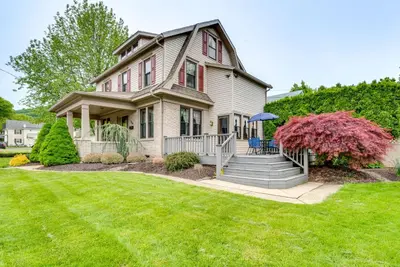 a house with a porch and a lawn at Pennsylvania Abode Near Little League World Series in Williamsport