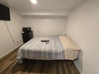 a bedroom with a bed in a room at Willoughby in Newark