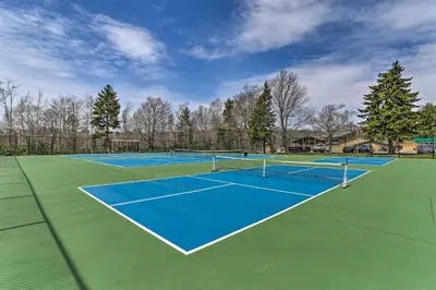 two tennis courts on a tennis court at Exciting Tobyhanna Home Near Kalahari Water Park! in Tobyhanna