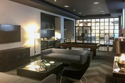a living room with a couch and a table at UWS 1BR w Gym WD Doorman nr Central Park NYC-377 in New York
