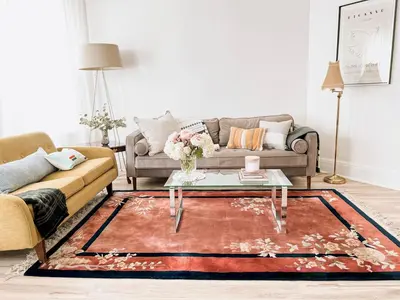 a living room with a couch and a coffee table at Designer Home 2 Bedroom - 20min to NYC WTC - Private Backyard in Harrison