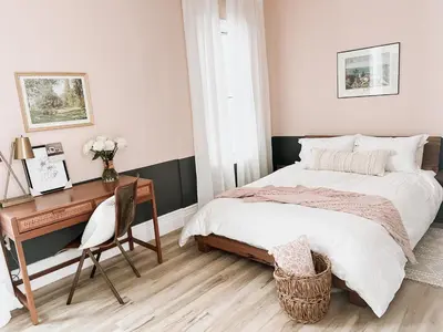 a bedroom with a desk and a bed and a desk at Designer Home 2 Bedroom - 20min to NYC WTC - Private Backyard in Harrison