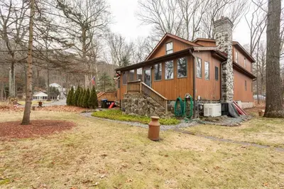 a house in the woods with at The country house in Greenwood Lake