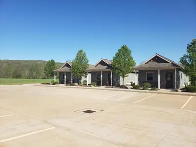 a large empty parking lot in front of a house at Vista Lodge Benton PA near Ricketts Glen State Park in Benton