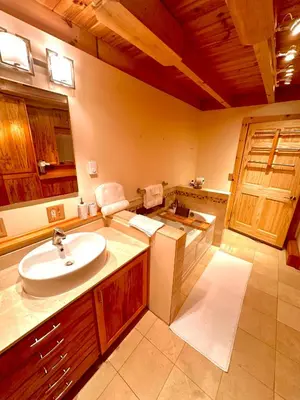 a bathroom with a sink and a counter top at Big Bear Cabin in Corning