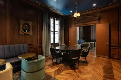 a dining room with a table and chairs at FiDi Studio w Gym Lounge Complete Gym NYC-499 in New York