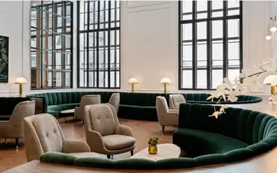 a living room with green couches and chairs at FiDi Studio w Gym Lounge Complete Gym NYC-499 in New York
