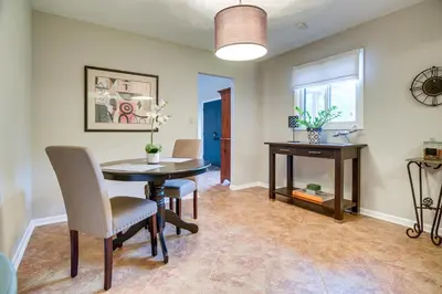 a dining room with a table and chairs at 3 Mi to Downtown Inviting Lancaster Home! in Lancaster