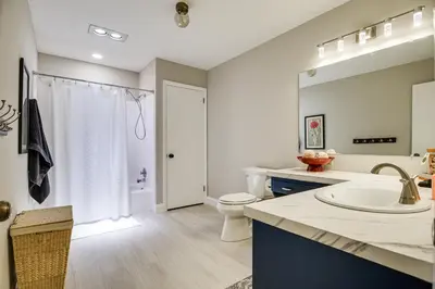 a bathroom with a sink and a toilet at 3 Mi to Downtown Inviting Lancaster Home! in Lancaster