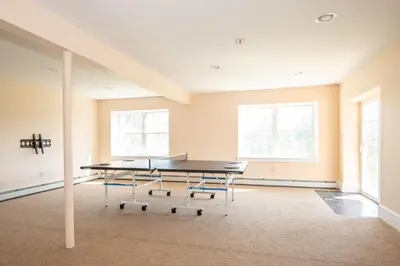 an empty room with a table and chairs in it at Dutch Country Acres in New Providence