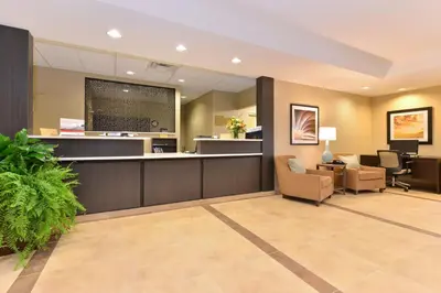 a waiting area of a hospital with a waiting room at Candlewood Suites Sayre by IHG in Sayre