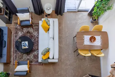 an overhead view of a living room with chairs and a table at Cozy 2BR condo w/ valley views in Vernon Township
