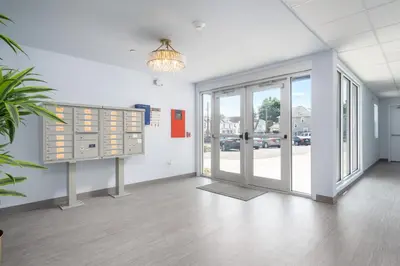 an empty office with a large glass door at Grand Monarch! Best for Extended Stays! in Johnson City