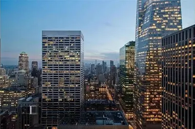 a view of a city with many tall buildings at Beautiful 2BD with a Gym near Times Square in New York