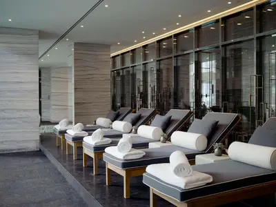 a row of chairs lined up in a building at Park Hyatt New York in New York
