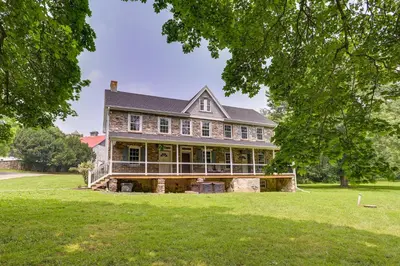 an image of a house with a large yard at Large Historic Home in Pennsylvania Dutch Country! in Coatesville