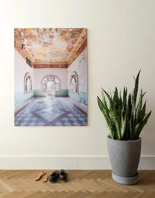 a painting of a room with a potted plant at ROOST Midtown in Philadelphia