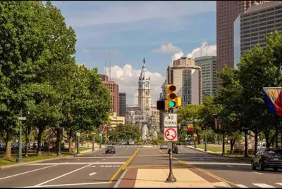 a street with a traffic light and a city at 503 Bohemian Romance Apartments in center city in Philadelphia
