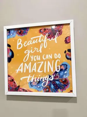 a framed picture of a sign on a wall at 504 Luxe 1BDR APT in center city in Philadelphia