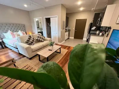 a living room with a couch and a coffee table at 502 Luxury 1BR apartment in center city in Philadelphia