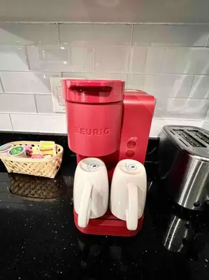 a red blender sitting on top of a counter at 402 Stylish luxe Apt at center city self check-in in Philadelphia
