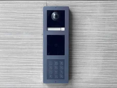 a remote control sitting on top of a wooden table at 408 Modern styles apartment in center city of Philly in Philadelphia