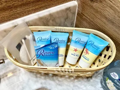 a basket with a bunch of toiletries in it at 408 Modern styles apartment in center city of Philly in Philadelphia