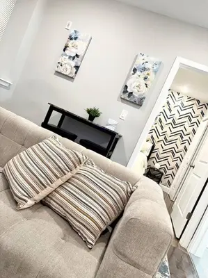 a living room with a couch and a table at 305 Cozy and lovely 1BDR apartment in Center City in Philadelphia
