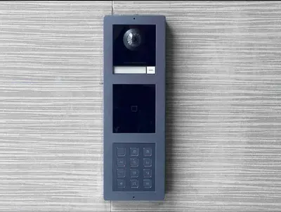 a remote control sitting on top of a wooden table at 308 Cozy and warm King Bed APT in center city in Philadelphia