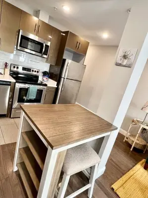 a kitchen with a wooden counter top in a room at 307 Kyoto style 1BDR Apt in center city in Philadelphia